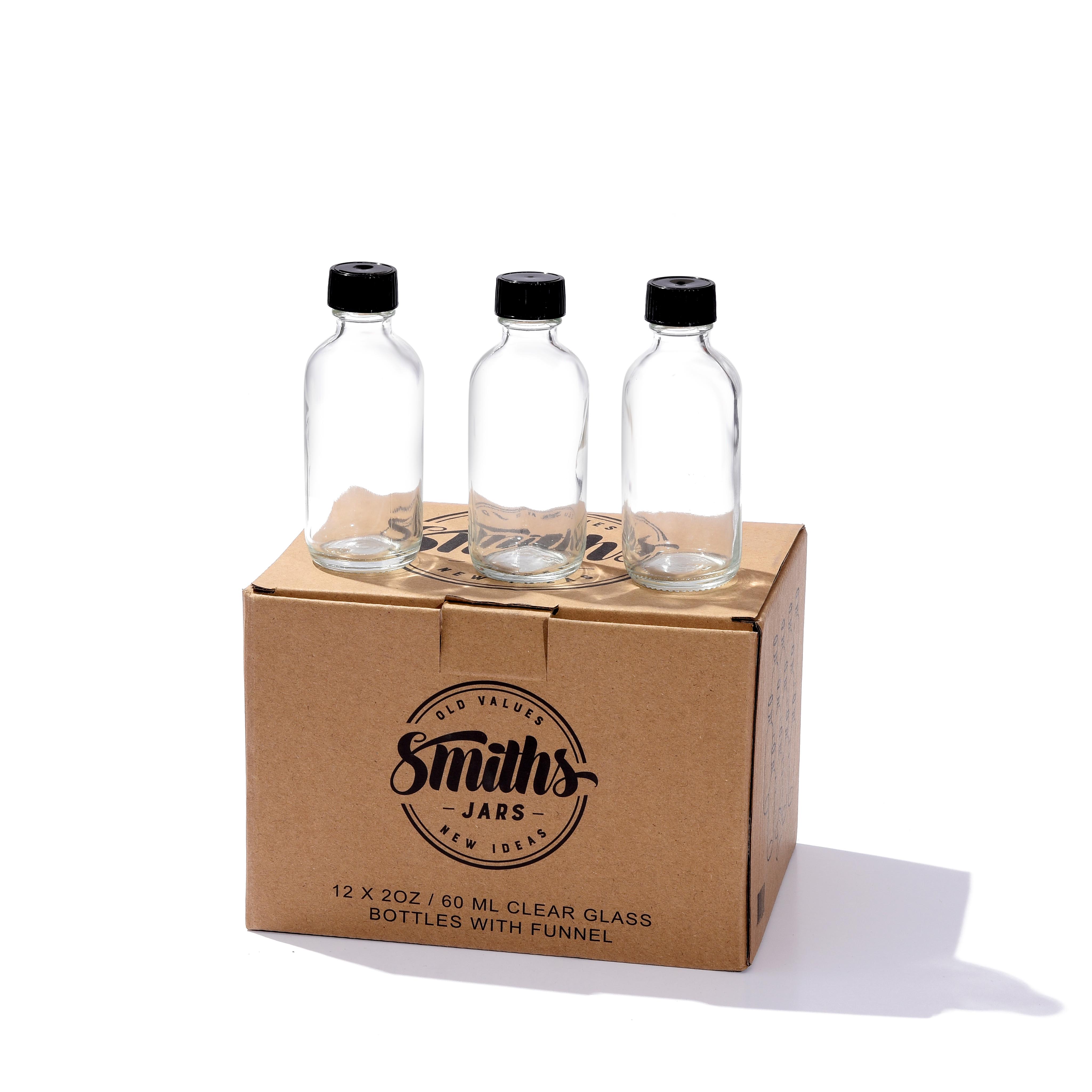 12x small bottles w funnel